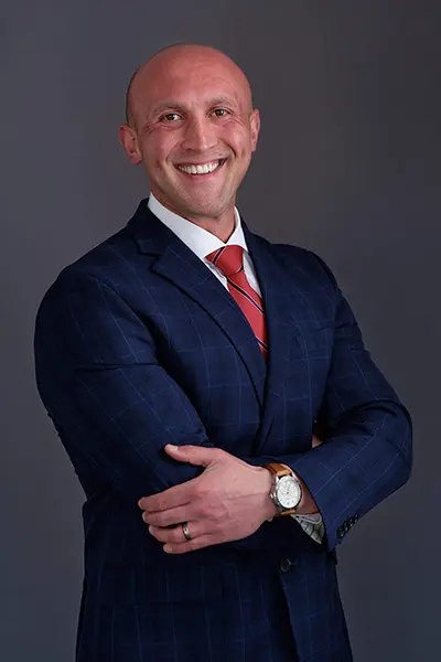 Headshot client of a business owner in a suit